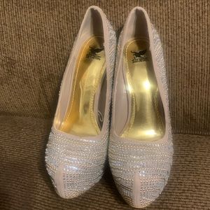 Brand new eye catching rhinestone coated pumps